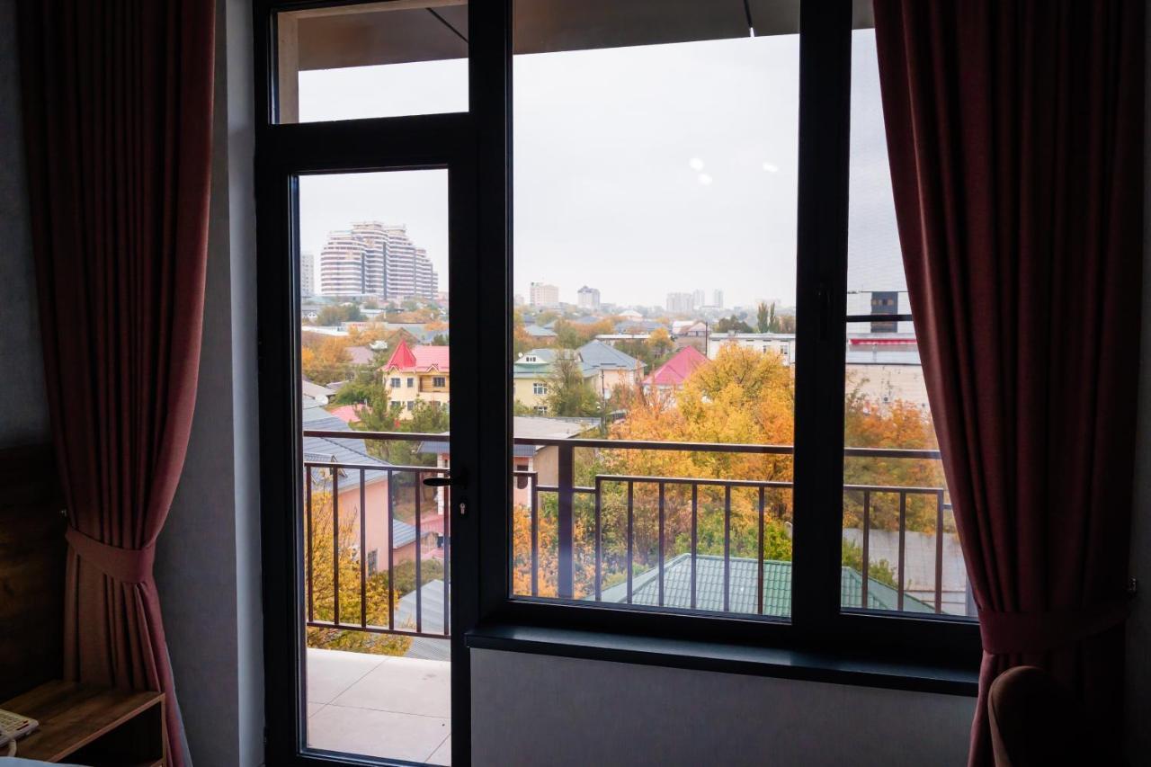Cosmopolitan Hotel Shymkent Exterior photo